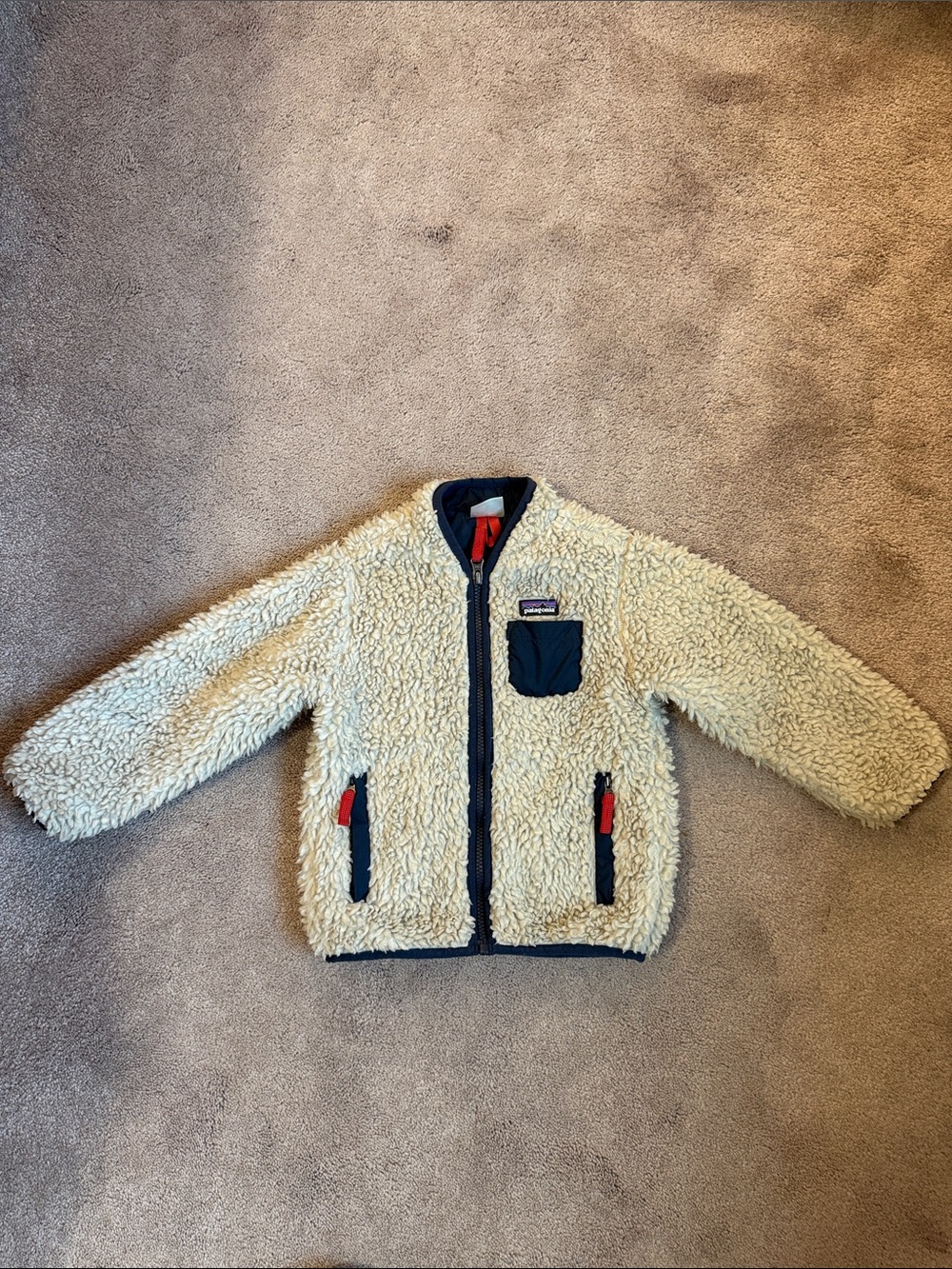 Patagonia Kids Cream Sherpa Jacket with Navy Trim and Red Pulls